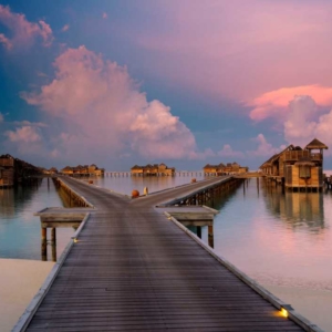 Best Overwater Bungalows - Gili Lankanfushi - jetty-1-at-sunset