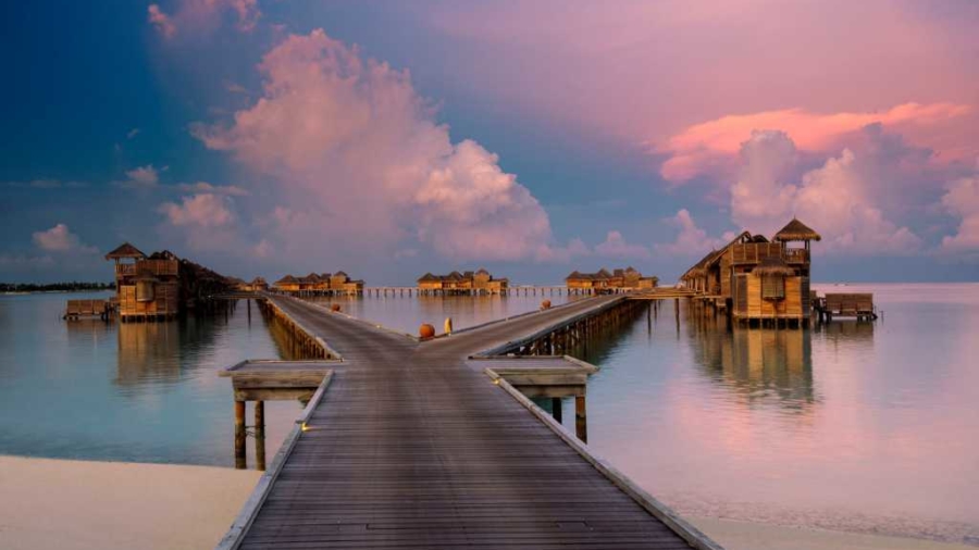 Best Overwater Bungalows - Gili Lankanfushi - jetty-1-at-sunset